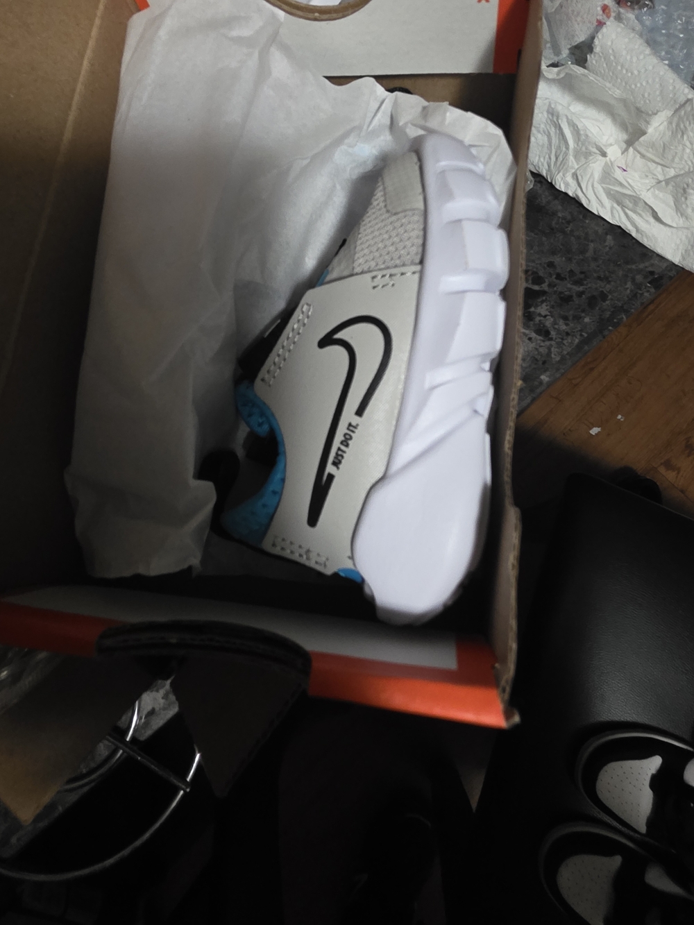 Nike Kids White and Light Gray Slip-On Sneaker with Blue Accents